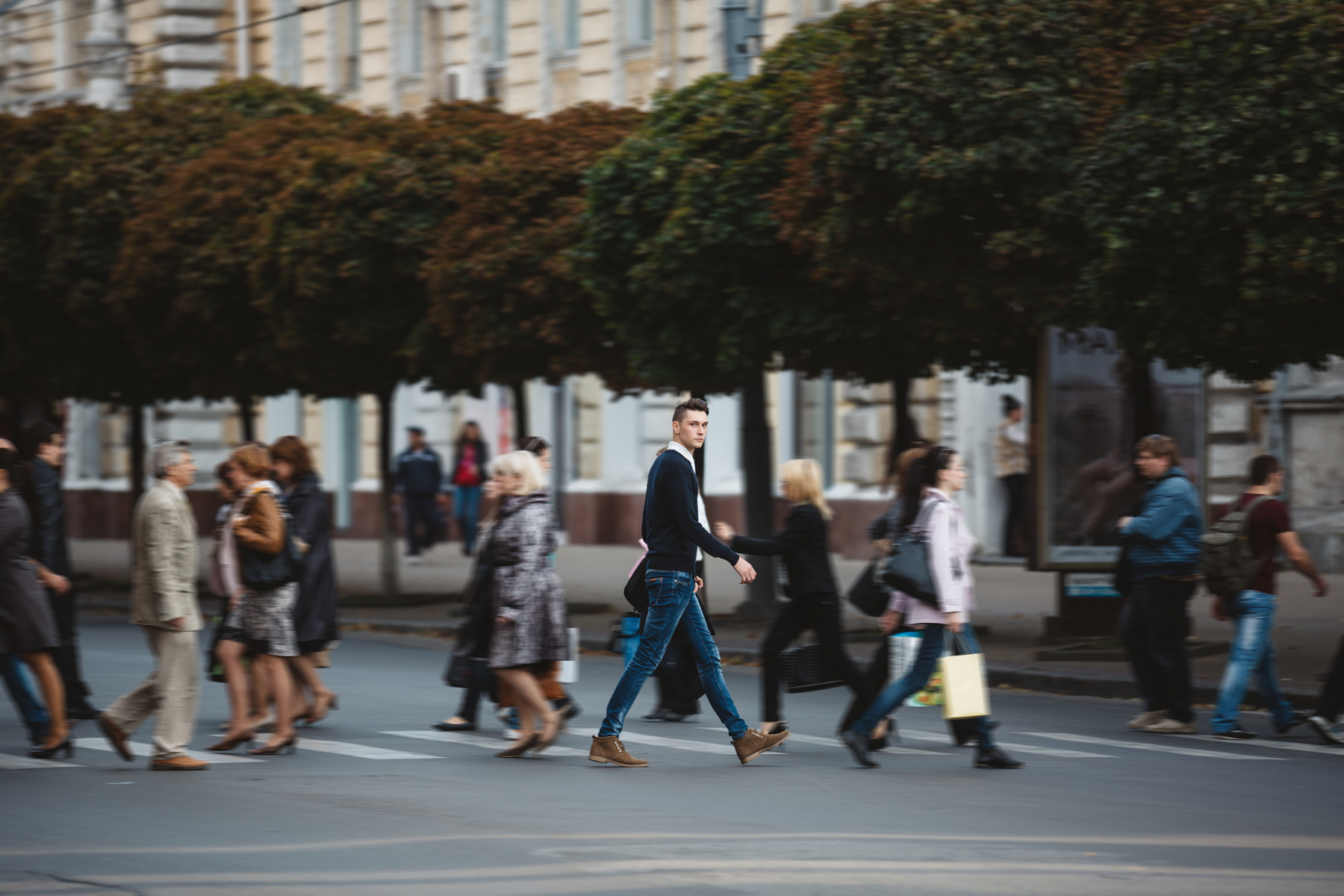 young-man-cross-street